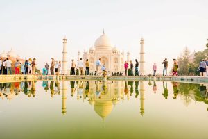 Tourists visit the Taj Mahal India | India Visa From Belgium | India eVisa